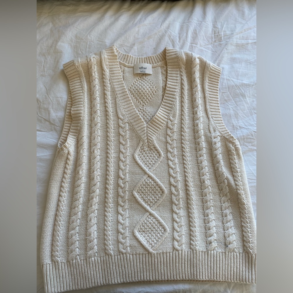 White sweater vest